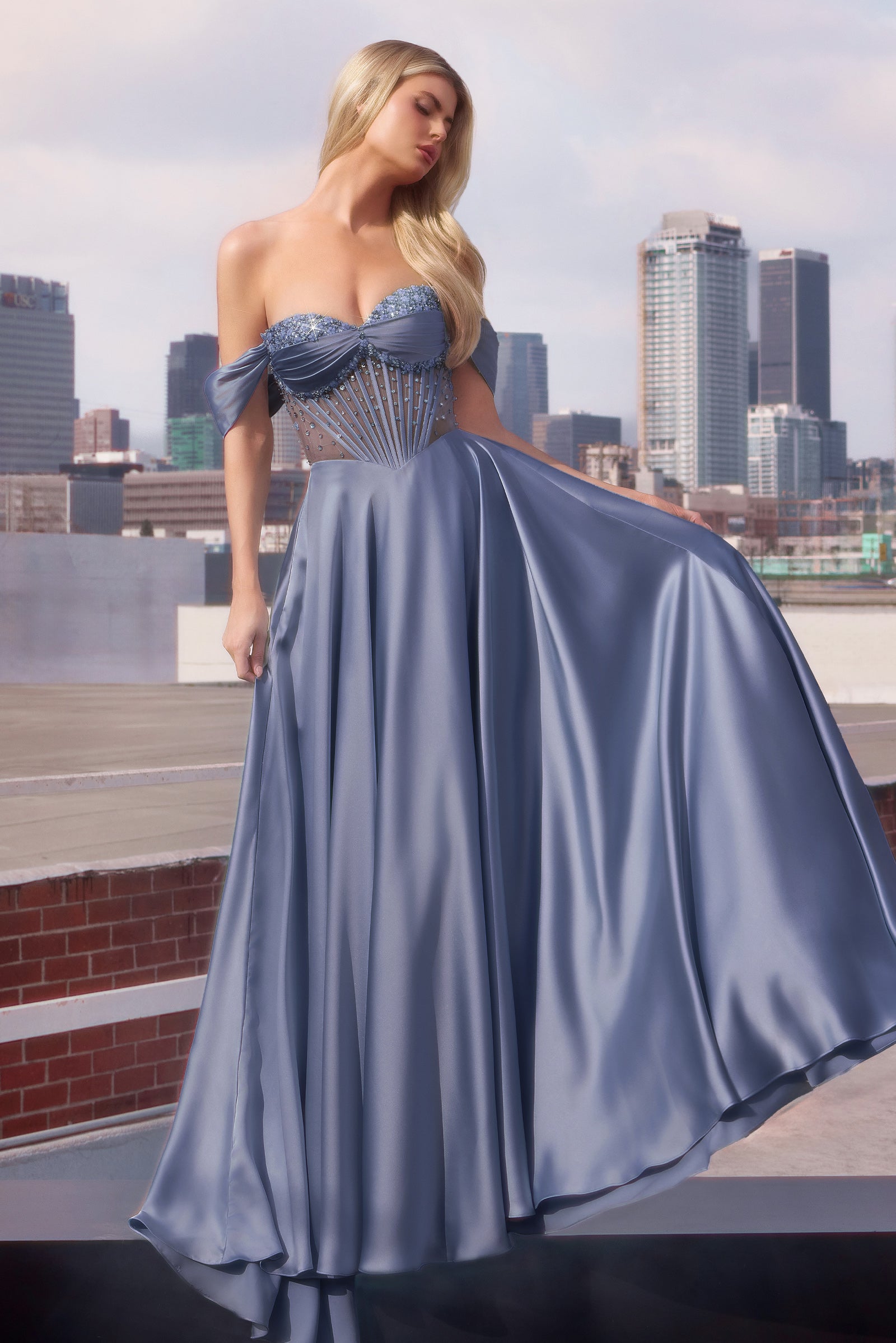 A-line gown combines a strapless sweetheart neckline with removable off-the-shoulder straps 