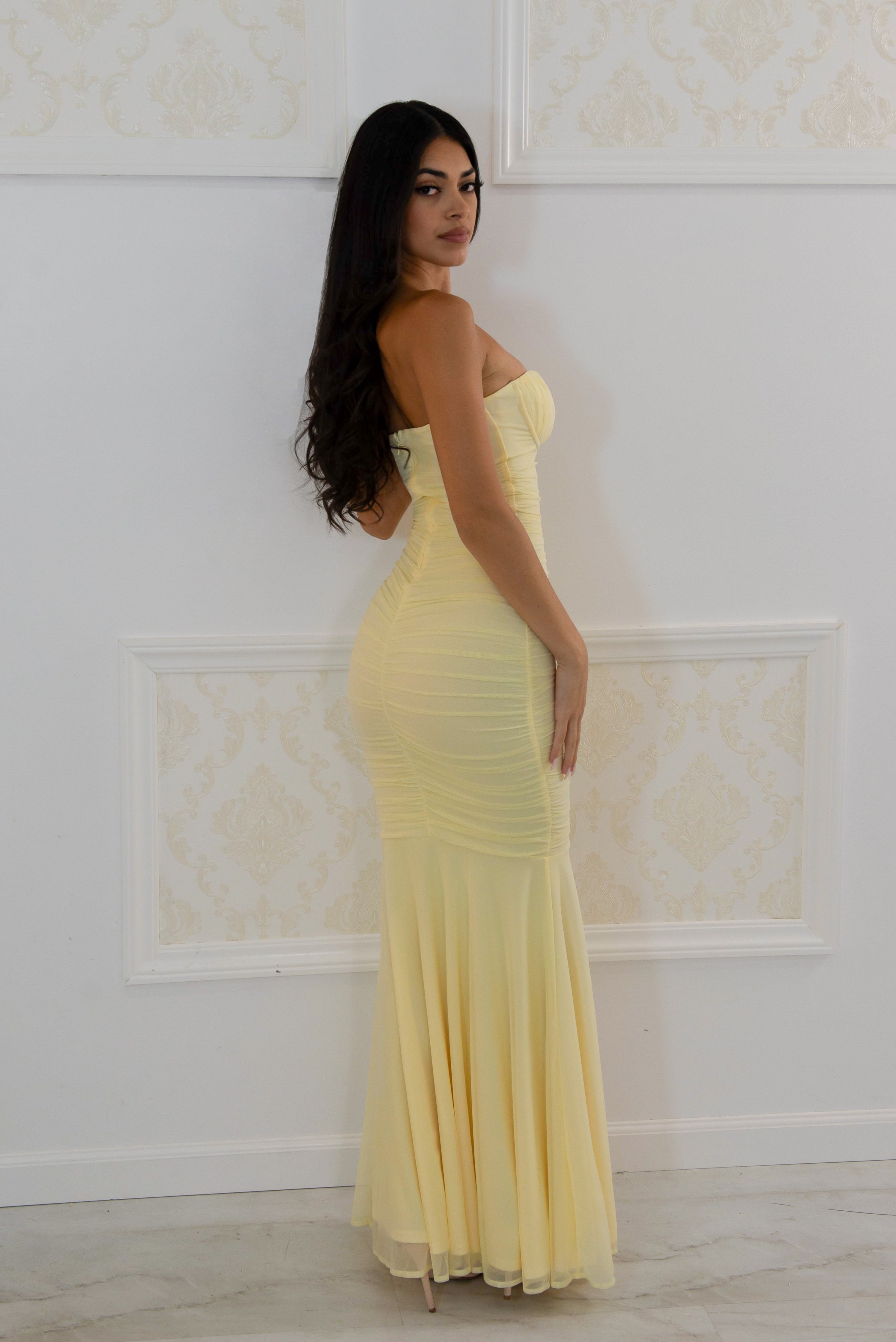 Yellow strapless ruched maxi dress with flared hem