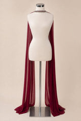A long sheer burgundy cape-style drape displayed on a white dress form mannequin with a silver stand, against a plain beige studio background.