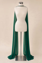 A dark green sheer cape-style drape displayed on a white mannequin torso with a silver stand against a plain beige studio background.