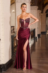 fitted gown featuring a sculpted corset bodice adorned with shimmering beadwork and intricate embellishments