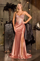 fitted gown featuring a sculpted corset bodice adorned with shimmering beadwork and intricate embellishments