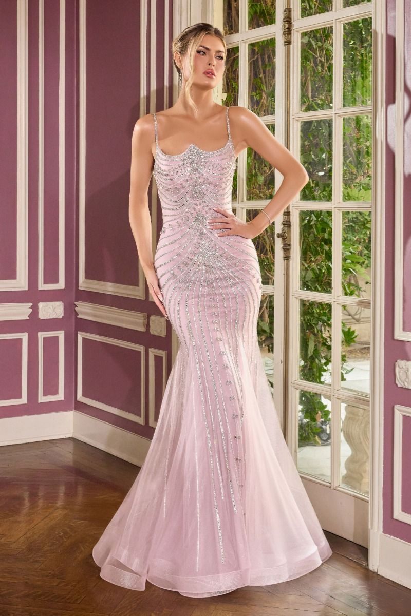 gown features a sleek fitted silhouette adorned with radiant beadwork arranged in sculptural, cascading lines