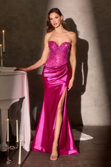  fitted gown stuns with a strapless sweetheart neckline and a crystal-embellished sheer corset bodice 