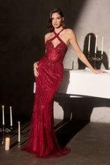 fitted gown features a striking halter neckline with an embellished crossover design