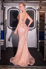 fitted mermaid gown radiates glamour with its crystal-adorned bodice and sculpting sheer corset.