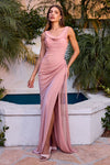 Model wearing a fitted gown with draped mesh overlay and ruched detailing