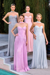 this gown features a strapless sweetheart neckline and a finely ruched bodice crafted from pleated luminescent chiffon