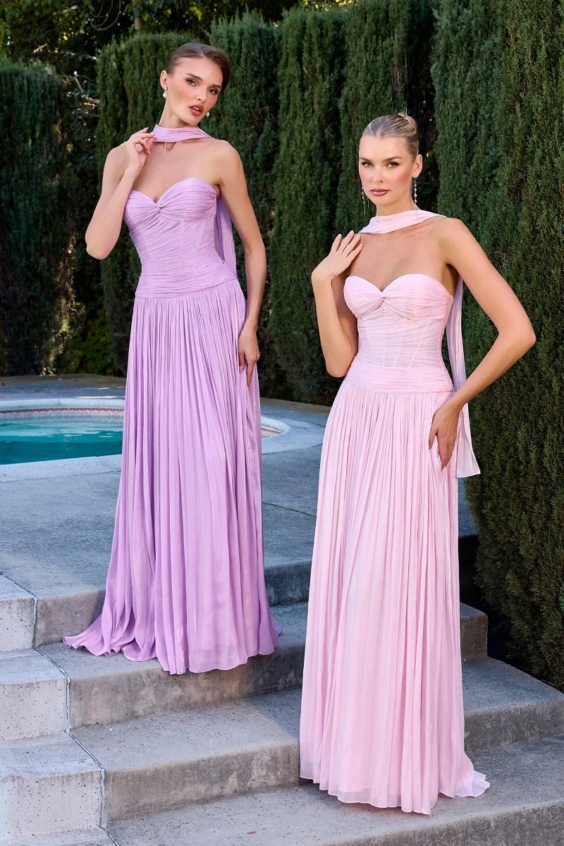 gown features a strapless sweetheart neckline and a finely ruched bodice crafted from pleated luminescent chiffon