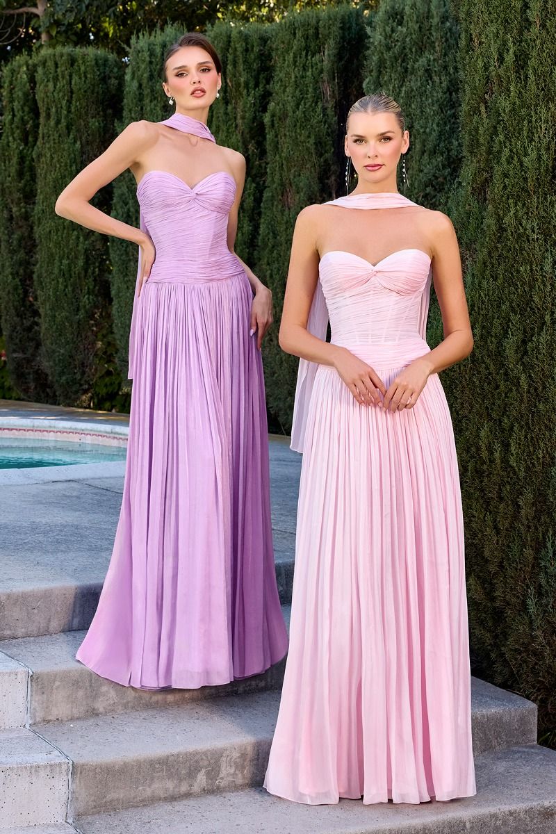 gown features a strapless sweetheart neckline and a finely ruched bodice crafted from pleated luminescent chiffon