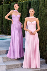 gown features a strapless sweetheart neckline and a finely ruched bodice crafted from pleated luminescent chiffon