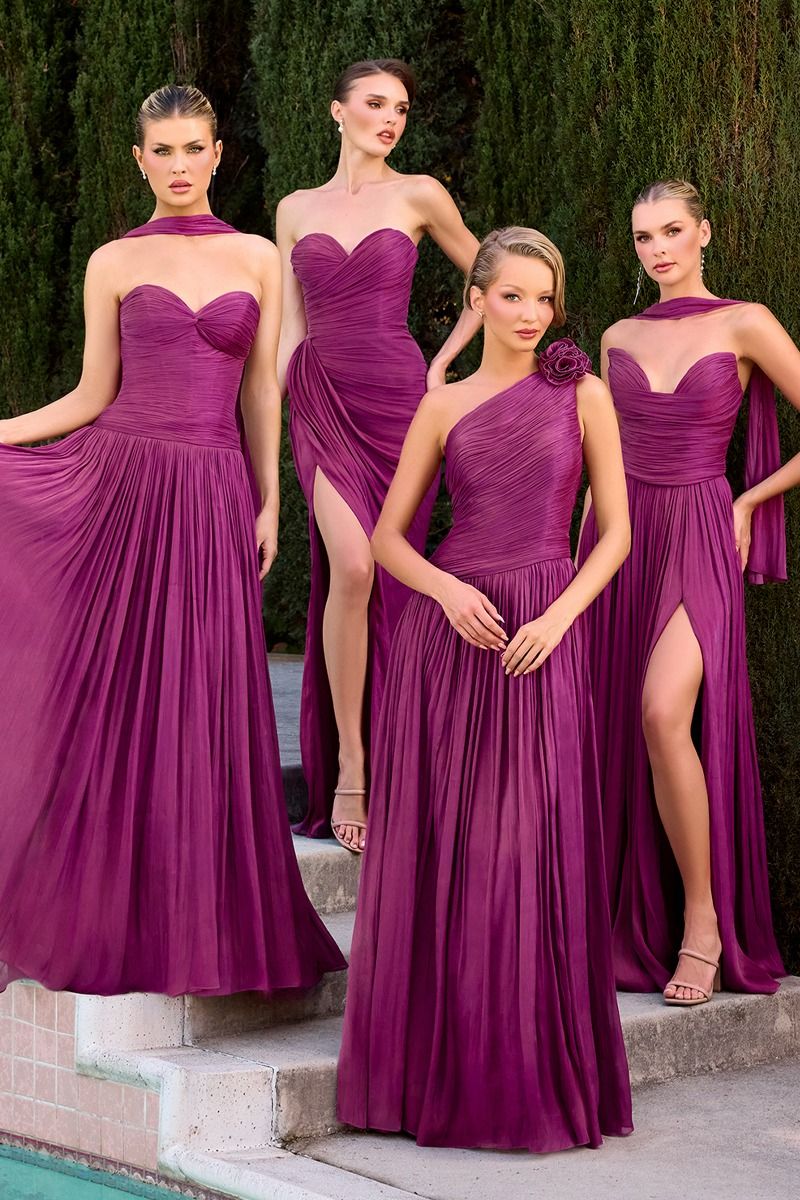 gown features a strapless sweetheart neckline and a finely ruched bodice crafted from pleated luminescent chiffon