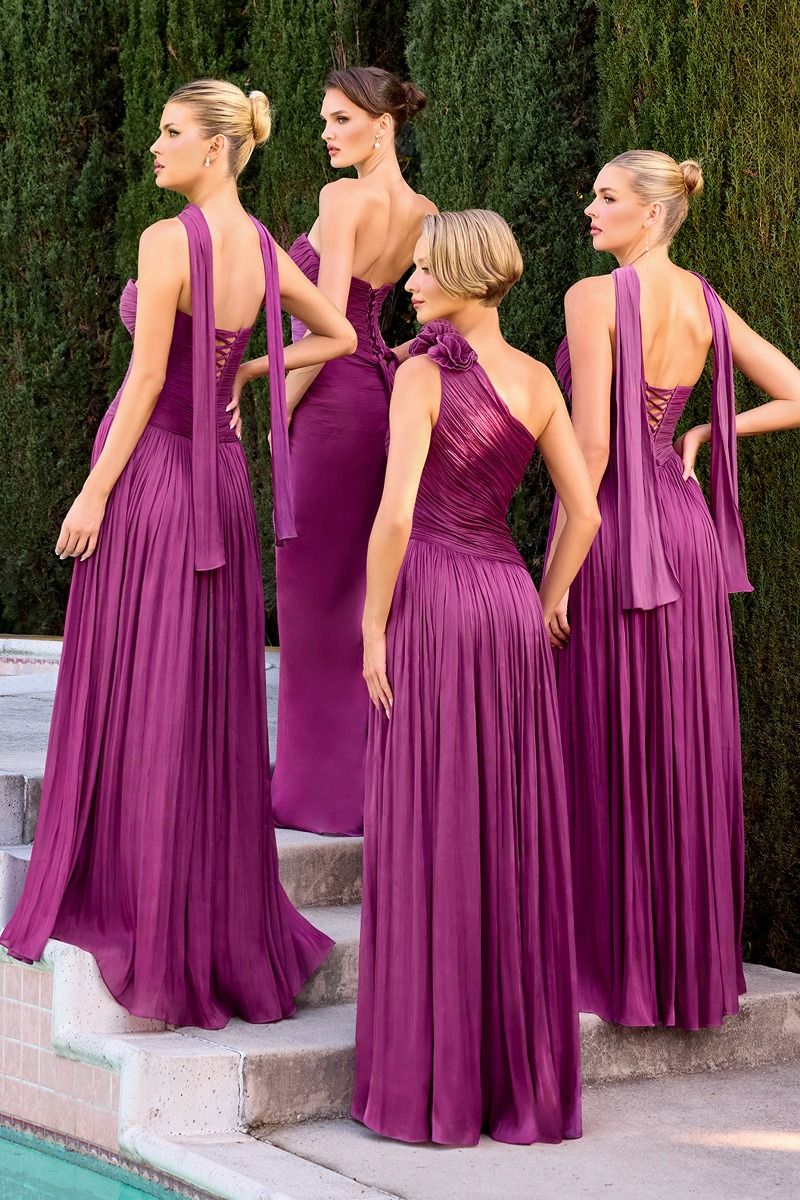 gown features a strapless sweetheart neckline and a finely ruched bodice crafted from pleated luminescent chiffon