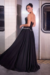  sculpted satin corset bodice, it features delicate crystal embellishments that trace along the neckline and waist 