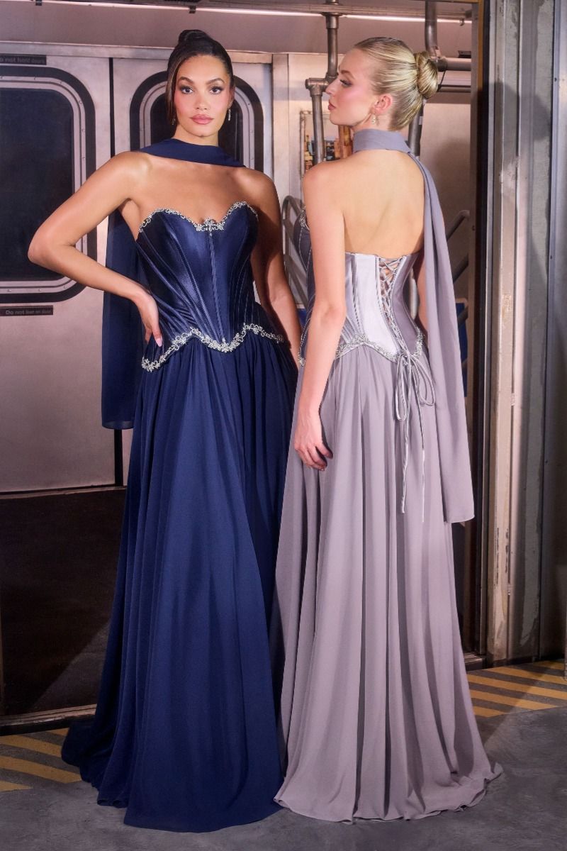 sculpted satin corset bodice, it features delicate crystal embellishments that trace along the neckline and waist