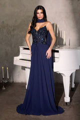 gown features a sweetheart illusion neckline paired with a shimmering, intricately beaded bodice