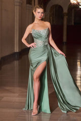 fitted gown captivates with its asymmetrical strapless neckline and hand-beaded embellishments