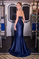 fitted halter gown featuring a plunging neckline adorned with intricate beadwork and sequin detailing