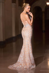 mermaid evening gown, designed with a halter neckline and a sheer corset bodice richly adorned with crystal and sequin embellishments