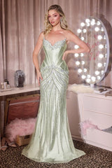 Model wearing a strapless fitted gown with structured corset bodice, ornate beaded detailing, and floor-length mermaid skirt