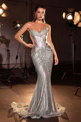 Model wearing a strapless fitted gown with structured corset bodice, ornate beaded detailing, and floor-length mermaid skirt