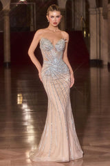 Woman wearing a sparkling evening gown in an elegant indoor setting