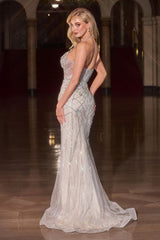sparkling silver-nude gown with a plunging neckline, structured corset bodice, and intricate crystal detailing throughout