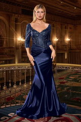 fitted evening gown features an embroidered bodice with a soft scoop neckline and elegant three-quarter sleeves