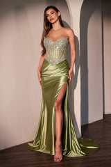  fitted gown showcases a strapless sweetheart neckline paired with a sheer crystal-embellished corset 