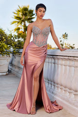  fitted gown showcases a strapless sweetheart neckline paired with a sheer crystal-embellished corset 