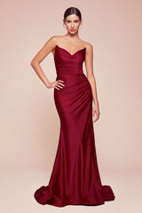 fitted dress features a strapless pointed V-neckline, gathered waistline, and a chic leg slit