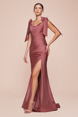  alluring off-the-shoulder neckline framed by elongated ties and a floor- pooling fishtail hem defined by a dramatic front slit 