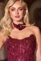 fitted gown with a strapless neckline, corset-style bodice, and sequin detailing.