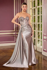 itted gown showcases a dramatic sweetheart neckline and a richly beaded bodice