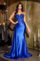 itted gown showcases a dramatic sweetheart neckline and a richly beaded bodice