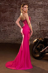 Model wearing a strapless gown featuring a beaded corset bodice, ruched waist detailing, and high side slit