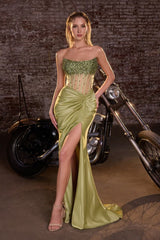 Model wearing a strapless gown featuring a beaded corset bodice, ruched waist detailing, and high side slit