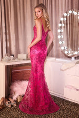 fitted gown, featuring a sheer corset bodice adorned with intricate beading and hand-placed appliqué