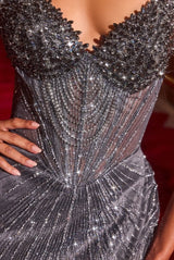 fitted gown showcases a sweetheart neckline with lavish crystal-encrusted detailing