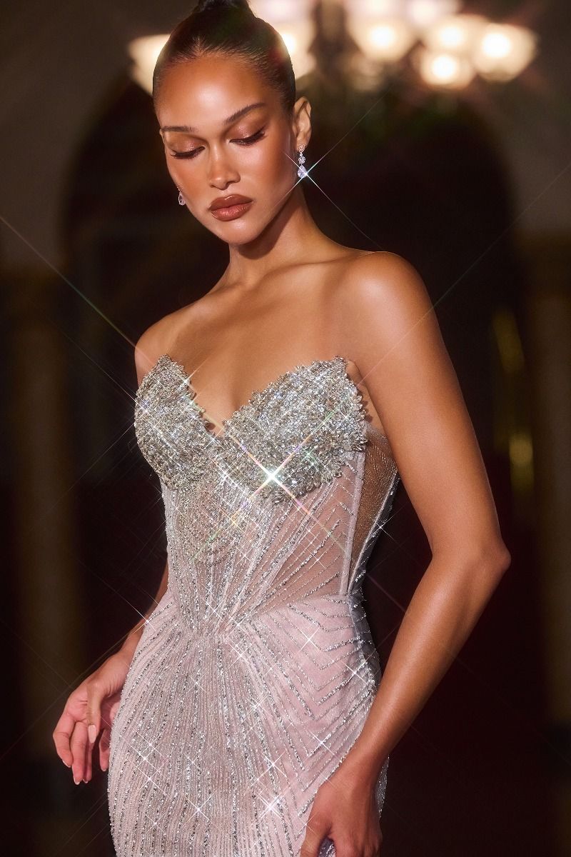 itted gown showcases a sweetheart neckline with lavish crystal-encrusted detailing
