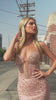 strapless sweetheart neckline and a sheer bodice adorned with an intricate beaded motif 