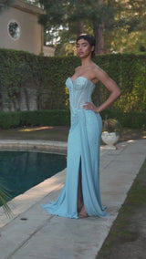 fitted strapless gown showcases a sweetheart neckline and a sheer bodice adorned with scattered rhinestone details 