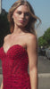 strapless sweetheart neckline and a sheer bodice adorned with an intricate beaded motif 