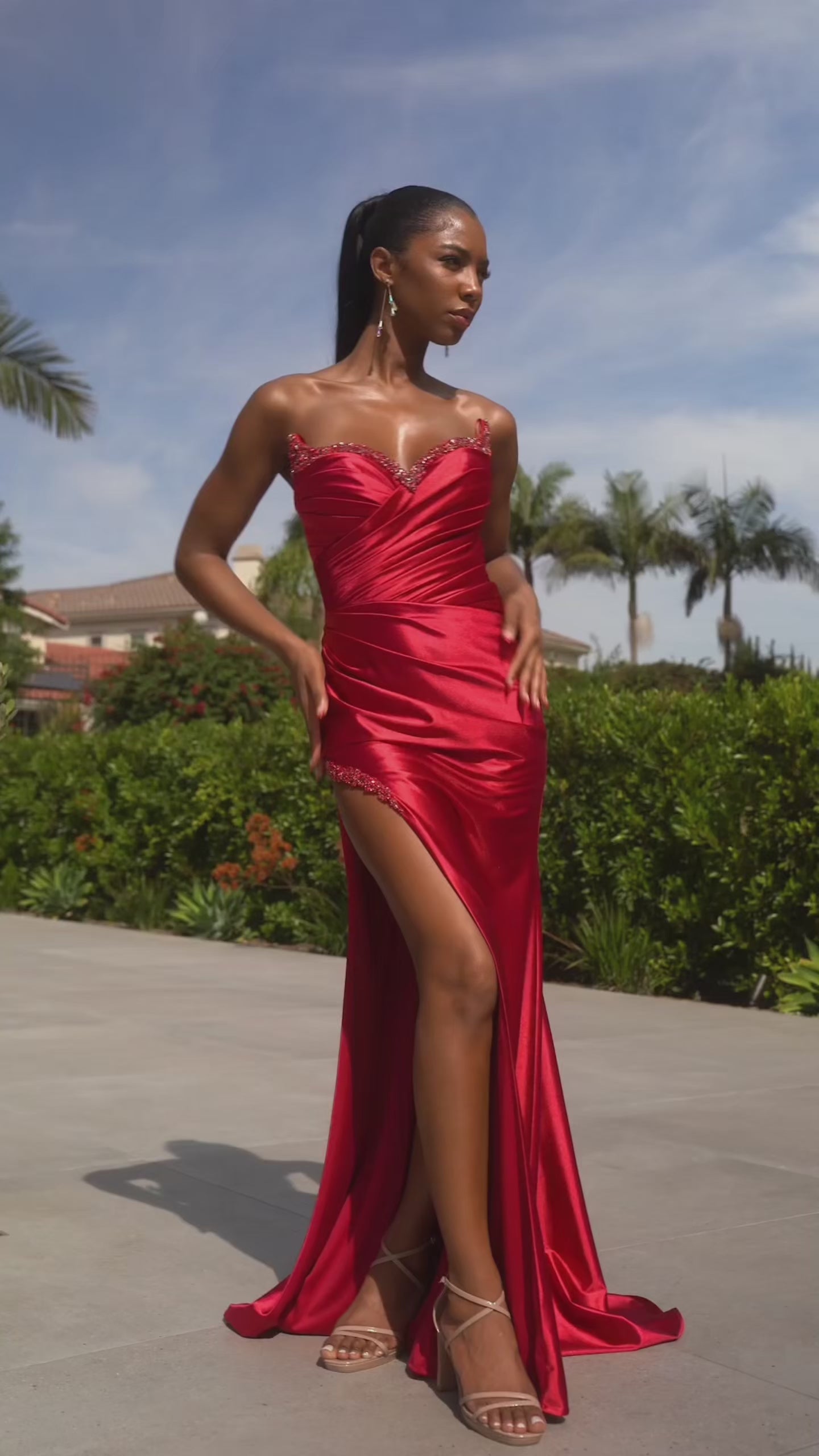 Strapless satin maxi gown with embellished details and side slit