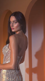 strapless reverse sweetheart neckline with a sheer embellished bodice that radiates elegance