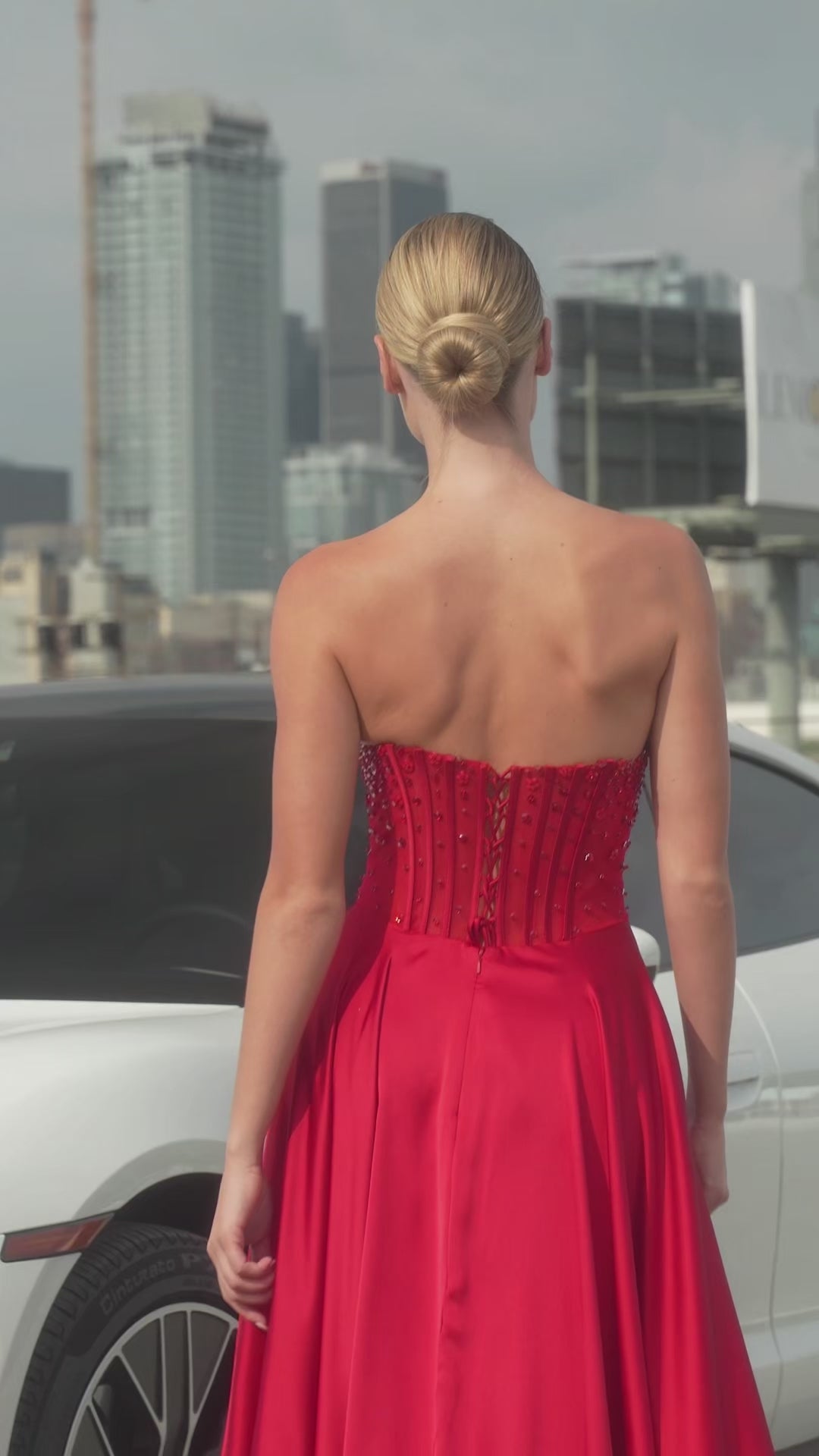 A-line gown combines a strapless sweetheart neckline with removable off-the-shoulder straps 