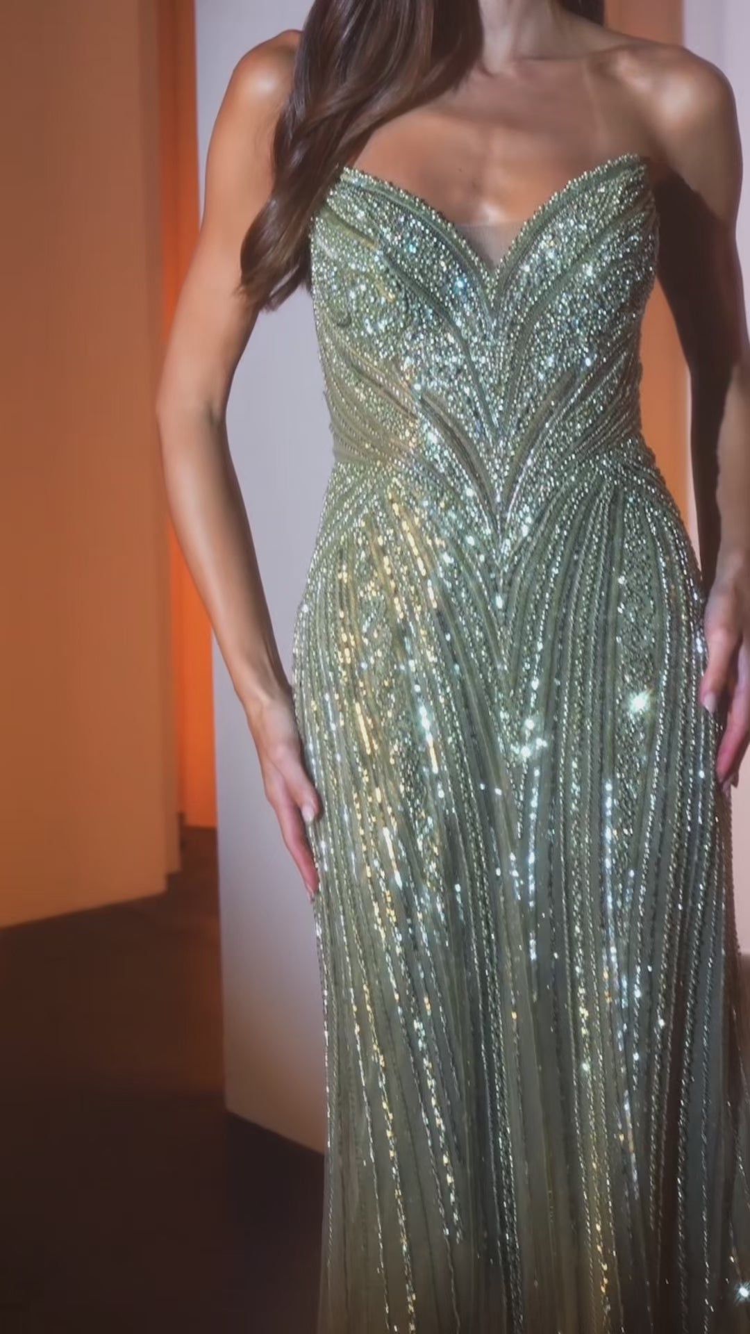 fitted gown featuring a chic halter keyhole neckline and a striking racerback design