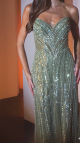 fitted gown featuring a chic halter keyhole neckline and a striking racerback design