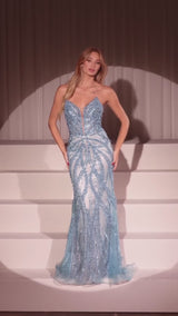 fitted strapless gown features a plunging neckline and an embellished contouring motif that beautifully enhances your silhouette