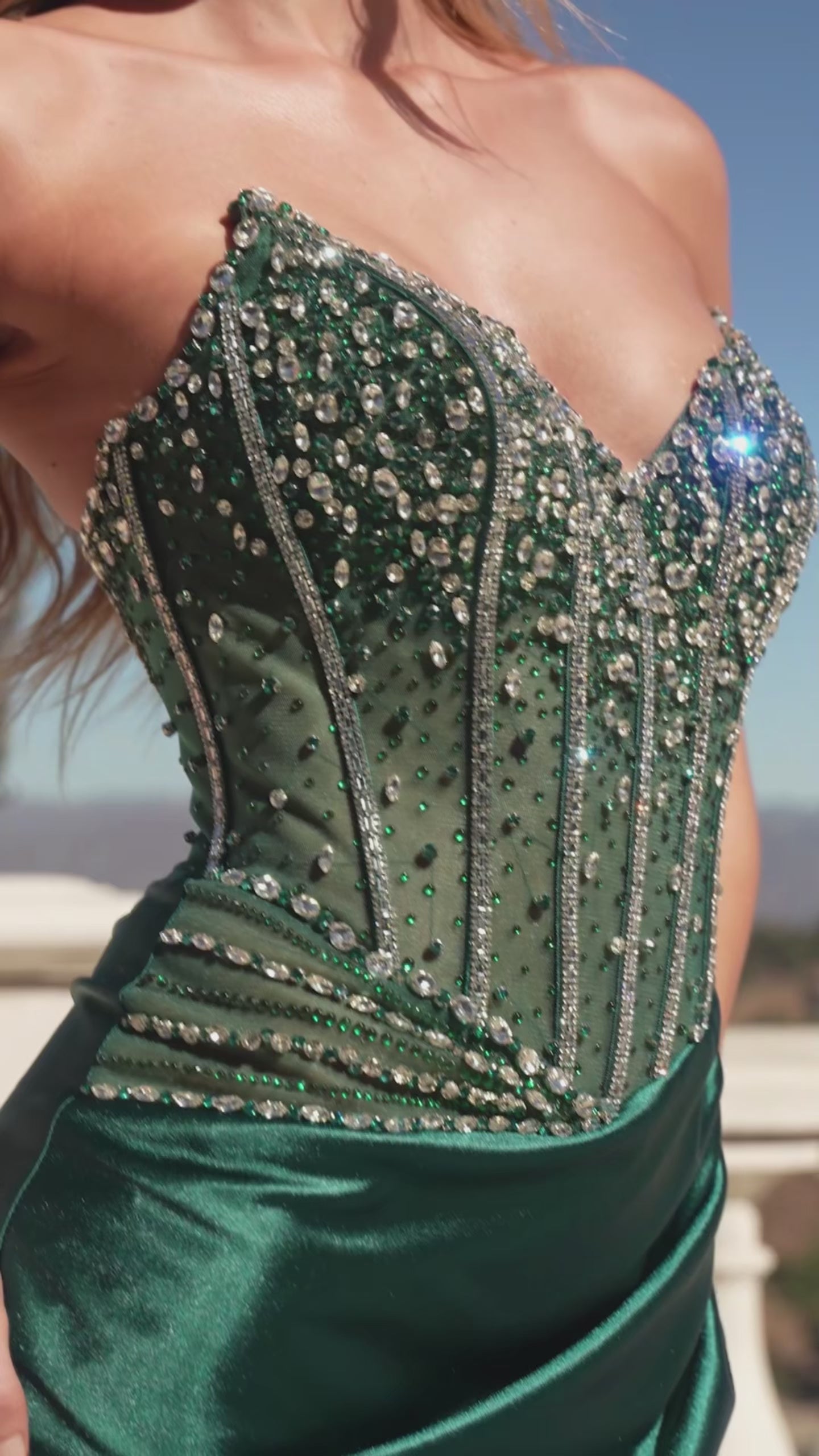 fitted dress features a strapless sweetheart neckline and a stunning beaded corset bodice 
